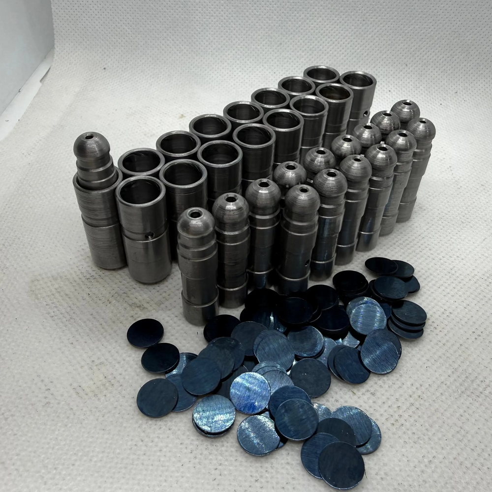 Ecotec solid lash adjuster bodies, inserts and adjustment shims