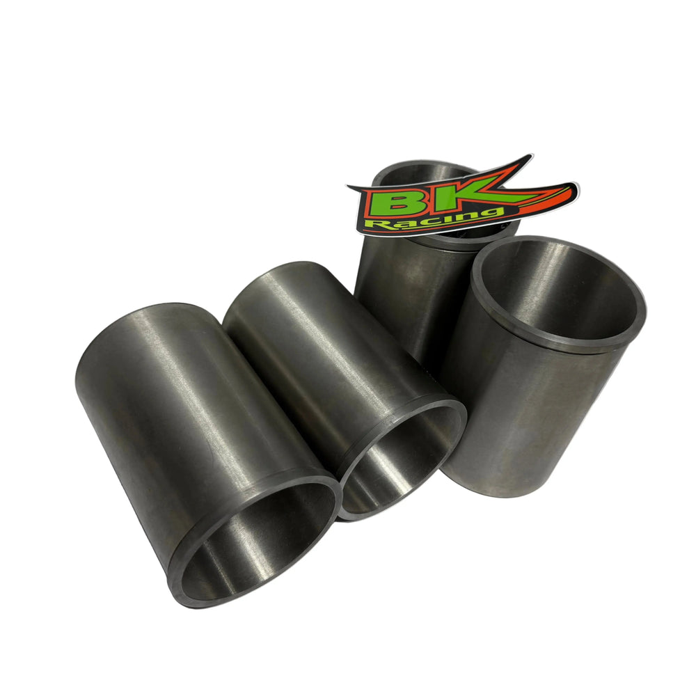 BK Racing Ecotec Big Bore Engine Sleeves displayed on a white surface with a BK Racing logo sticker on one of them.