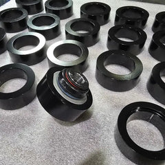BK Racing Solid Rear Lower Control Arm Bushings (Pair) – Zero-Deflection Upgrade with In-House Machined Sleeves